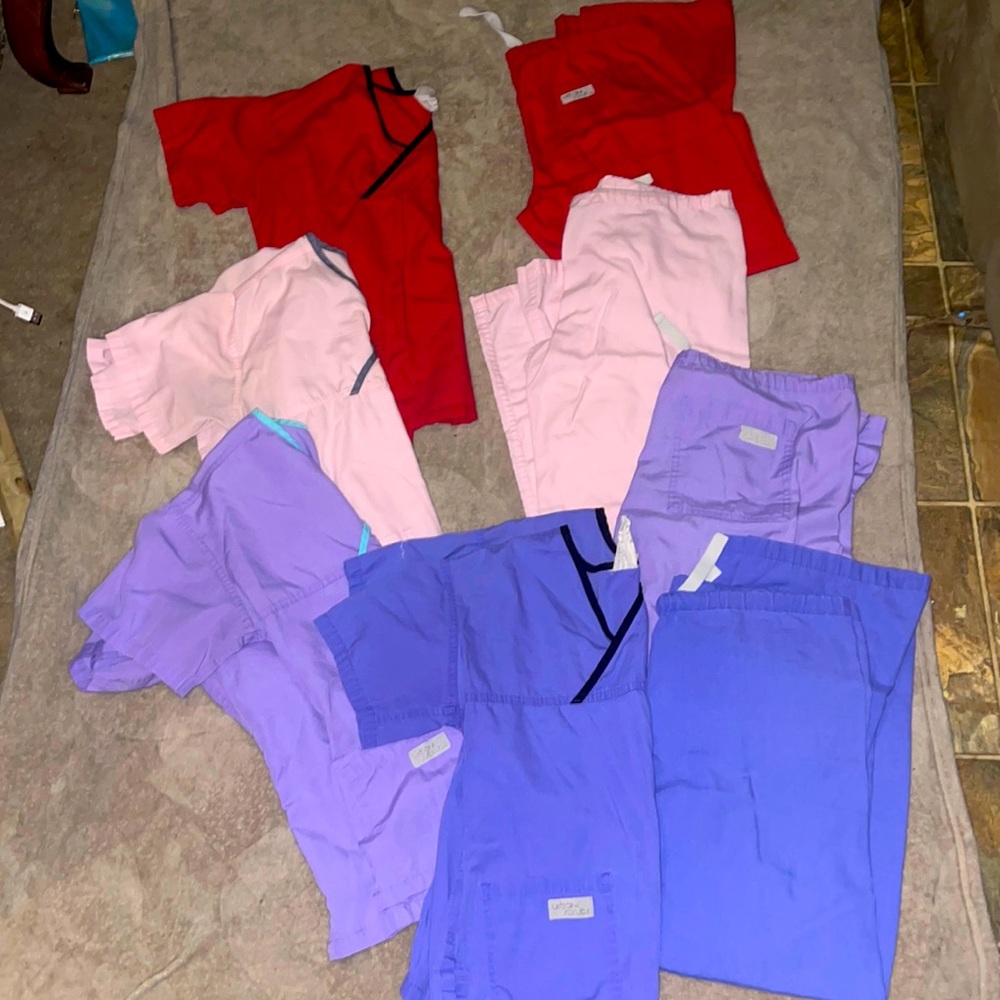 4 sets of scrubs